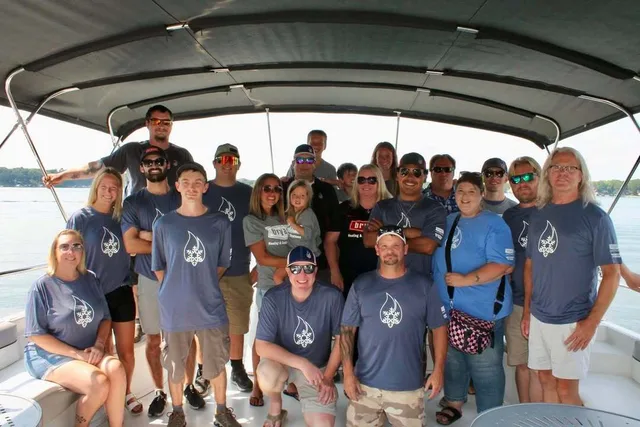 The full Mankato Heating & Cooling team gathered together on a boat outing